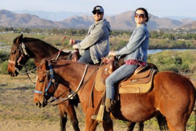 horseback riding couple